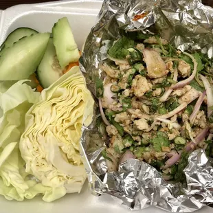 Koy pa (fish meat cooked w/ lemongrass, mint, lime, etc)