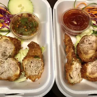 Chicken Legs Thai Herbs (left) vs Stuffed Chicken Wings (right). Similar, but the legs seem more moist.