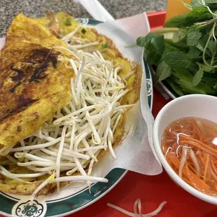 Banh xeo with uncooked bean sprouts