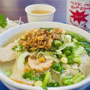 a bowl of soup and a cup of coffee