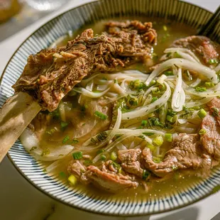 Experience the epitome of homemade comfort with our Beef Phở Ribeye with Rib-bone