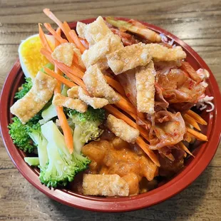 a bowl of asian food