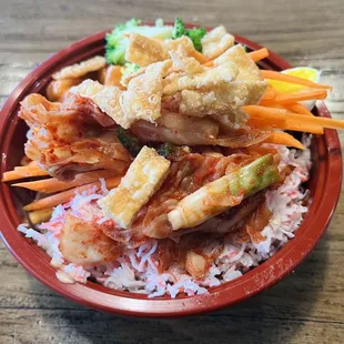 a bowl of rice and vegetables