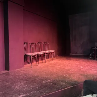empty stage with chairs