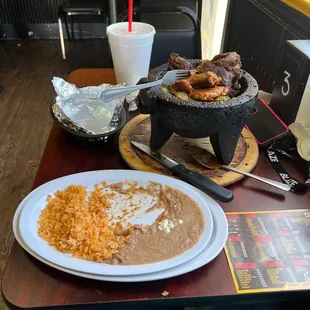 a table with mexican food and drinks