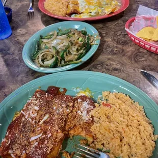 Trio Cheese Enchilada. Nicely Filled. Great Sauce. Not Pictured: Table Salsa 4.5/5 Spicy Tomahto W/ Cilantro.