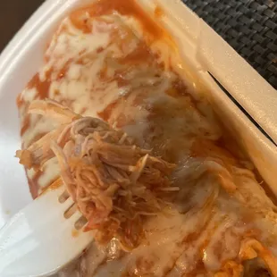 Juicy chicken inside the wet burrito