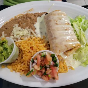 Pork chimichanga. Actually crispy!!!! Pico and guac on the side