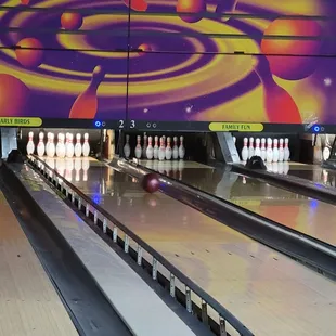 a bowling alley with bowling pins