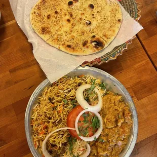 Butter chicken and biryani combo and garlic naan