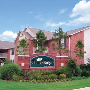 Exterior of building with sign and logo