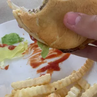 Burger was too good to not dive in right away and had to grab a picture halfway though