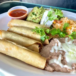 Flautas de pollo Outstanding. Moist shredded mixed chicken fried to perfection