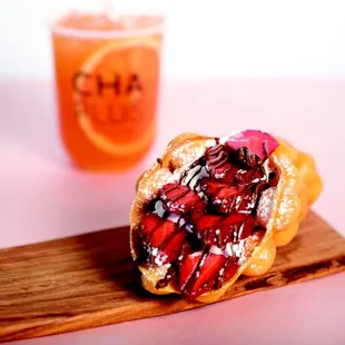 a half eaten pastry and a drink