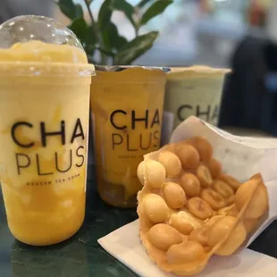 a cup of chaplus and a bag of cashews