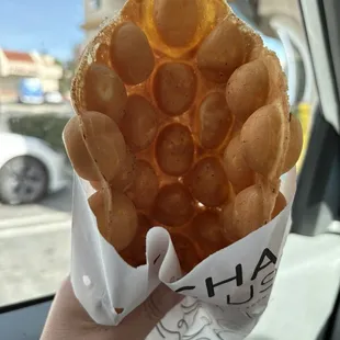 Original bubble waffle. Made to order. They have other toppings options.