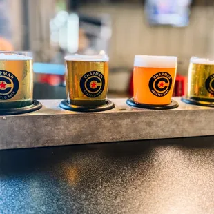 a row of glasses of beer