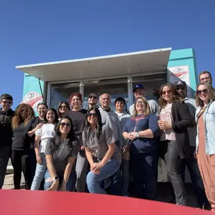 a group of people posing for a picture