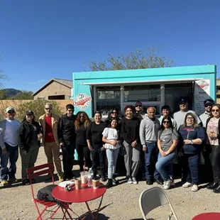 a group of people posing for a picture
