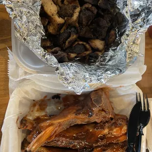 Pork ribs on the bottom, burnt ends on the top.