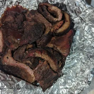 Burnt ends ? ( I added the sauce) Not good