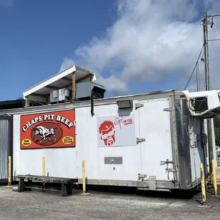 a truck parked in front of a building