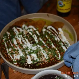 Chicken enchiladas with 3 different, out of this world, moles.