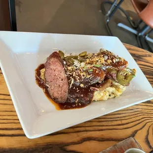 Charred Bits and Grits - sauce is VERY spicy