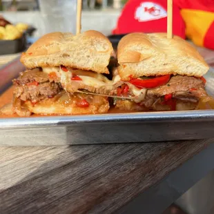 Brisket and gouda cheese on a buttered roll.