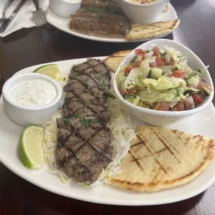 Steak tenderloin plate was even better then gyros flavors of the grill and side salad with it was delicious