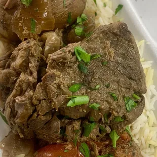 Taas Kabob over rice