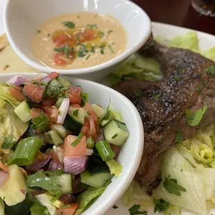 Dark meat chicken, hummus and salad