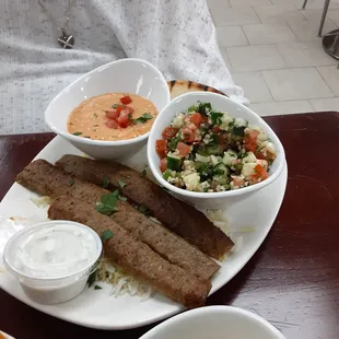 gyro, two sides hummous, tabbouli  the Tzatziki dip was delicious-did not ask but almost certainly homemade