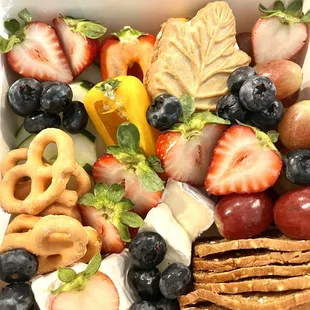  a variety of fruit and crackers