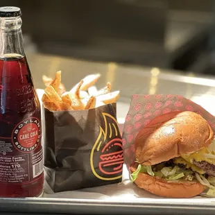 Cane cola, order of fries and a double hot chard burger