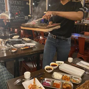 a woman serving food