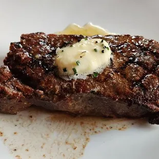 Truffle butter laden NY strip steak.