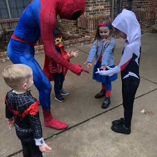 Spiderman teaching the kids proper spidey poses