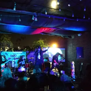 A bit blurry, Outside patio area "American Zombie" on stage!