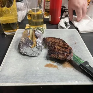 a steak on a cutting board