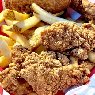 Chicken Tenders, served with honey mustard and French Fries.