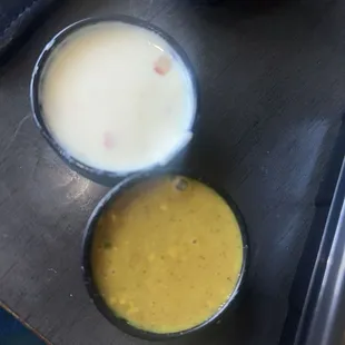 Honey mustard and queso dipping sauces for the pretzels