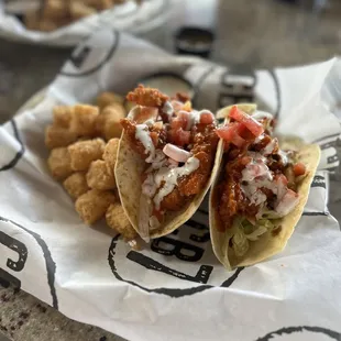 Buffalo chicken tacos and tater tots