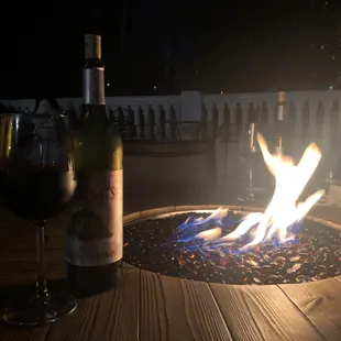 Wonderful fire pit table to enjoy some evening wine.