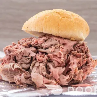 a pulled pork sandwich on a bun