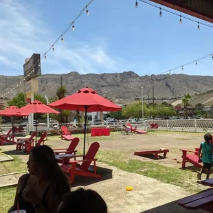 red chairs and red umbrellas