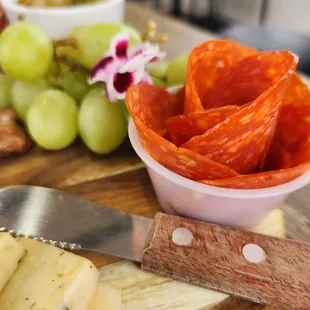 a variety of cheeses and meats