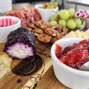 a variety of cheese and fruit