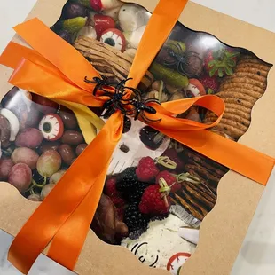 Don't waste time with standard treats for your Halloween gathering, contact Us for your death defying Charcuterie Board