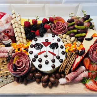 Don't waste time with standard treats for your Halloween gathering, contact Us for your death defying Charcuterie Board